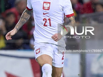 Nicola Zalewski of Poland is in action during the UEFA Nations League 2024/25 League A Group A1 match between Portugal and Poland at Estadio...