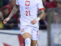 Nicola Zalewski of Poland is in action during the UEFA Nations League 2024/25 League A Group A1 match between Portugal and Poland at Estadio...