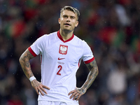 Kamil Piatkowski of Poland reacts during the UEFA Nations League 2024/25 League A Group A1 match between Portugal and Poland at Estadio Do D...