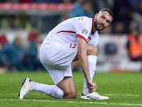 Sebastian Walukiewicz of Poland reacts during the UEFA Nations League 2024/25 League A Group A1 match between Portugal and Poland at Estadio...