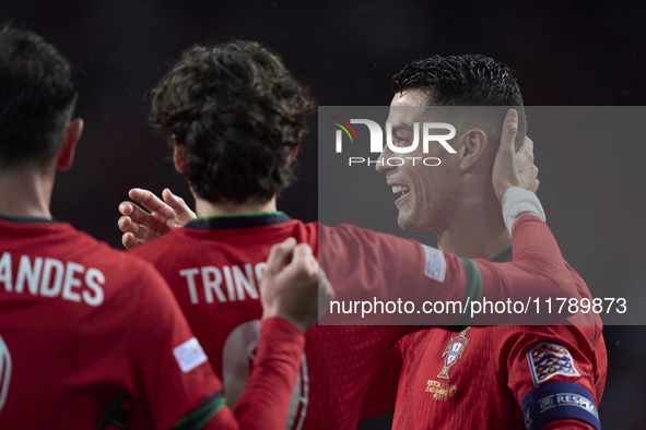 Cristiano Ronaldo of Portugal celebrates with his teammates after scoring his team's fourth goal during the UEFA Nations League 2024/25 Leag...