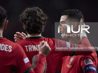 Cristiano Ronaldo of Portugal celebrates with his teammates after scoring his team's fourth goal during the UEFA Nations League 2024/25 Leag...