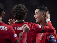 Cristiano Ronaldo of Portugal celebrates with his teammates after scoring his team's fourth goal during the UEFA Nations League 2024/25 Leag...