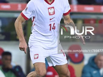 Jakub Kiwior of Poland is in action during the UEFA Nations League 2024/25 League A Group A1 match between Portugal and Poland at Estadio Do...