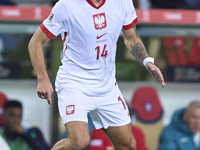 Jakub Kiwior of Poland is in action during the UEFA Nations League 2024/25 League A Group A1 match between Portugal and Poland at Estadio Do...