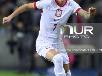 Kacper Urbanski of Poland plays during the UEFA Nations League 2024/25 League A Group A1 match between Portugal and Poland at Estadio Do Dra...