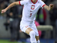 Kacper Urbanski of Poland plays during the UEFA Nations League 2024/25 League A Group A1 match between Portugal and Poland at Estadio Do Dra...