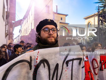 Approximately one thousand people, according to organizers, join a demonstration in Pisa, Italy, on November 15, 2024. The protest includes...