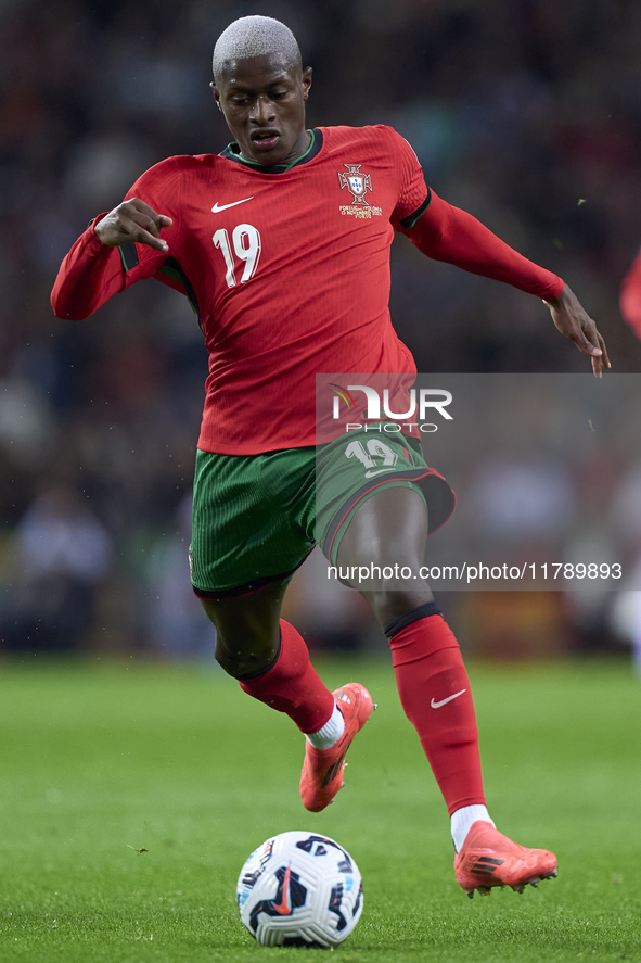 Nuno Mendes of Portugal is in action during the UEFA Nations League 2024/25 League A Group A1 match between Portugal and Poland at Estadio D...