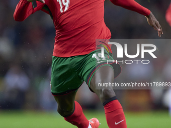 Nuno Mendes of Portugal is in action during the UEFA Nations League 2024/25 League A Group A1 match between Portugal and Poland at Estadio D...