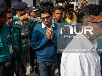 Zunaid Ahmed Palak, former Minister of State for the Ministry of Posts, Telecommunications and Information Technology, holds his hands toget...