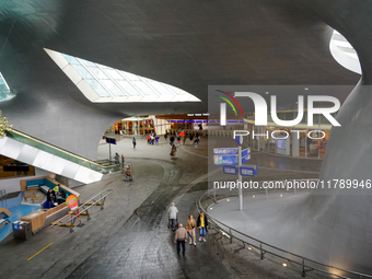 The entrance hall of Arnhem Centraal Station in Arnhem, Netherlands, on July 27, 2023, features a striking architectural design with flowing...