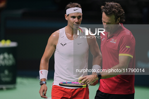 Rafael Nadal (L) of Team Spain and Carlos Moya (R) former player during Spain's training session prior to the Davis Cup match at Palacio de...