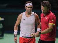 Rafael Nadal (L) of Team Spain and Carlos Moya (R) former player during Spain's training session prior to the Davis Cup match at Palacio de...