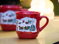 Gluhwein glasses are seen at Cologne Christmas in front of Dam Cathedral in Cologne, Germany, on November 18, 2024. (