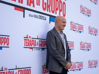 Claudio Bisio attends the ''Una Terapia Di Gruppo'' photocall at The Space Cinema Moderno in Rome, Italy, on November 18, 2024. (