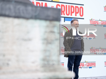 Director Paolo Costella attends the ''Una Terapia Di Gruppo'' photocall at The Space Cinema Moderno in Rome, Italy, on November 18, 2024. (