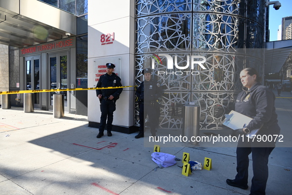 A suspect is taken into custody in front of Turkish House near the United Nations Headquarters after several stabbings leave two dead and on...