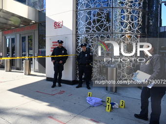 A suspect is taken into custody in front of Turkish House near the United Nations Headquarters after several stabbings leave two dead and on...