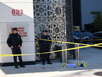 A suspect is taken into custody in front of Turkish House near the United Nations Headquarters after several stabbings leave two dead and on...