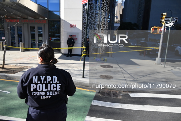 A suspect is taken into custody in front of Turkish House near the United Nations Headquarters after several stabbings leave two dead and on...