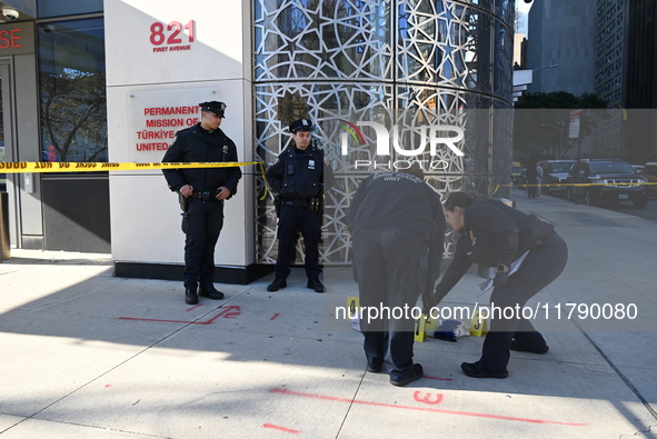 A suspect is taken into custody in front of Turkish House near the United Nations Headquarters after several stabbings leave two dead and on...