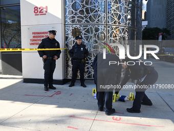 A suspect is taken into custody in front of Turkish House near the United Nations Headquarters after several stabbings leave two dead and on...