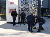 A suspect is taken into custody in front of Turkish House near the United Nations Headquarters after several stabbings leave two dead and on...