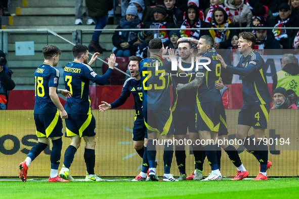 A Scottish player celebrates scoring his first goal during the UEFA Nations League 2024 Group A A1 match between Poland and Scotland at PGE...