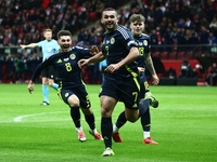 John McGinn celebrates his goal during UEFA Nations League match Poland - Scotland at National Stadium in Warsaw, Poland on November 18, 202...