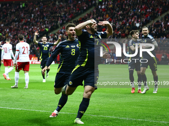 John McGinn celebrates his goal during UEFA Nations League match Poland - Scotland at National Stadium in Warsaw, Poland on November 18, 202...