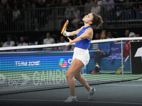 MALAGA, SPAIN - NOVEMBER 18: Jasmine Paolini of Team Italy in her singles match against Iga Swiatek of Team Poland in the Semi-Final tie bet...