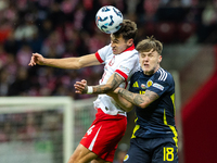 Jakub Kiwior, Ben Doak are playing during the  UEFA Nations League 2024 League A Group A1 match between Poland and Scotland, at the  PGE Nar...