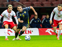 Jakub Kaminski, John McGinn are playing during the  UEFA Nations League 2024 League A Group A1 match between Poland and Scotland, at the  PG...