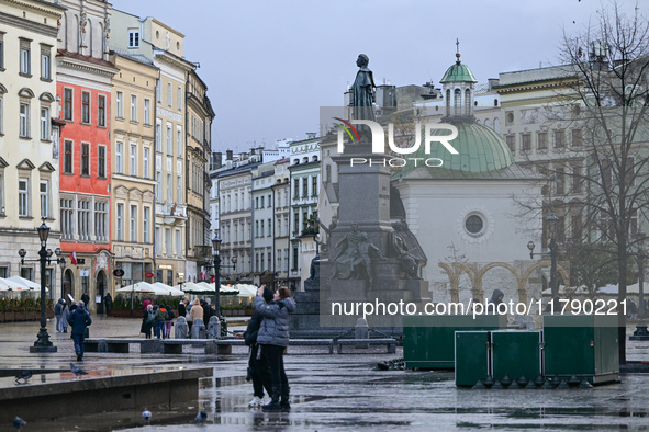 KRAKOW, POLAND - NOVEMBER 18:   
Partial view of a quiet and nearly empty Krakow's UNESCO-listed Market Square on a rainy and cold November...