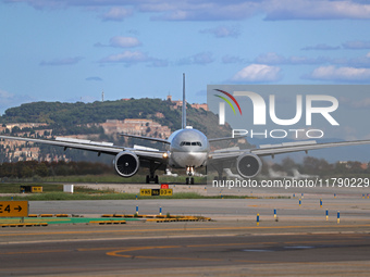 A Boeing 777-3DZ(ER) from Qatar Airways lands at Barcelona-El Prat Airport and heads towards the terminal in Barcelona, Spain, on October 8,...