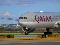 A Boeing 777-3DZ(ER) from Qatar Airways lands at Barcelona-El Prat Airport and heads towards the terminal in Barcelona, Spain, on October 8,...