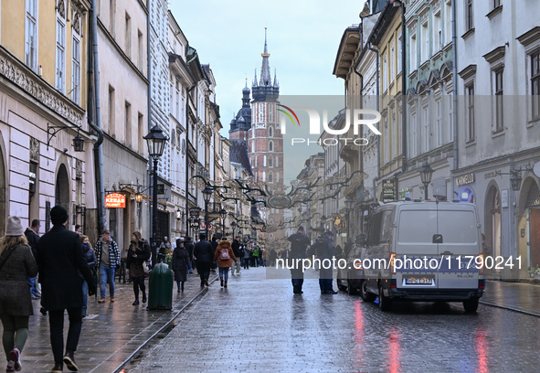 KRAKOW, POLAND - NOVEMBER 18:   
Members of the Polish Police stop a car on Floriańska Pedestrian Street in Krakow, seen on November 17, 202...