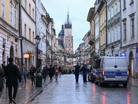 KRAKOW, POLAND - NOVEMBER 18:   
Members of the Polish Police stop a car on Floriańska Pedestrian Street in Krakow, seen on November 17, 202...