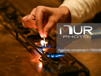 KRAKOW, POLAND - NOVEMBER 18:   
Staff member turns on natural gas burners on a stove in a Krakow cafe, seen on November 17, 2024 in Krakow,...