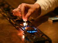 KRAKOW, POLAND - NOVEMBER 18:   
Staff member turns on natural gas burners on a stove in a Krakow cafe, seen on November 17, 2024 in Krakow,...