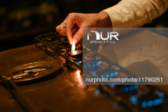 KRAKOW, POLAND - NOVEMBER 18:   
Staff member turns on natural gas burners on a stove in a Krakow cafe, seen on November 17, 2024 in Krakow,...