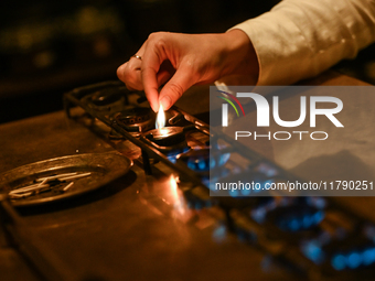 KRAKOW, POLAND - NOVEMBER 18:   
Staff member turns on natural gas burners on a stove in a Krakow cafe, seen on November 17, 2024 in Krakow,...