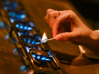 KRAKOW, POLAND - NOVEMBER 18:   
Staff member turns on natural gas burners on a stove in a Krakow cafe, seen on November 17, 2024 in Krakow,...