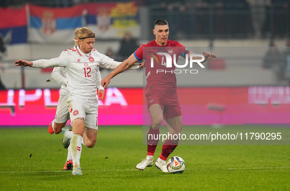 Nikola Milenkovic of Serbia  controls the ball during the Nations League Round 6 match between Serbia qnd Denmark at Dubocica Stadium, Lesko...