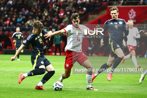 Ben Doak and Jakub Kiwior during UEFA Nations League match Poland - Scotland at National Stadium in Warsaw, Poland on November 18, 2024. 