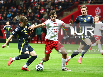 Ben Doak and Jakub Kiwior during UEFA Nations League match Poland - Scotland at National Stadium in Warsaw, Poland on November 18, 2024. (