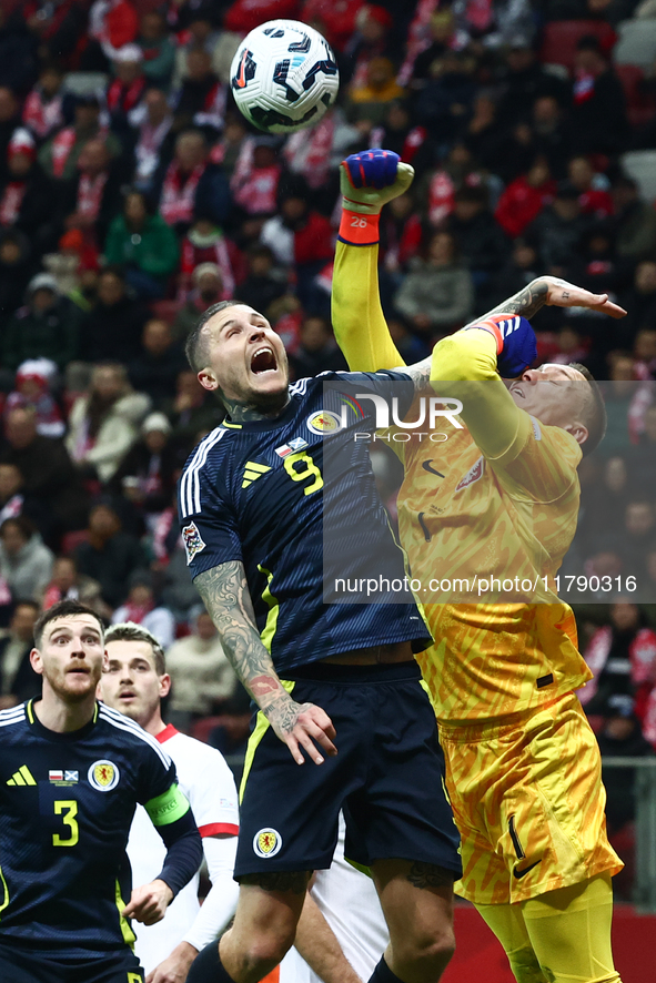 Lyndon Dykes and Lukasz Skorupski during UEFA Nations League match Poland - Scotland at National Stadium in Warsaw, Poland on November 18, 2...