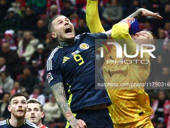 Lyndon Dykes and Lukasz Skorupski during UEFA Nations League match Poland - Scotland at National Stadium in Warsaw, Poland on November 18, 2...