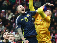 Lyndon Dykes and Lukasz Skorupski during UEFA Nations League match Poland - Scotland at National Stadium in Warsaw, Poland on November 18, 2...